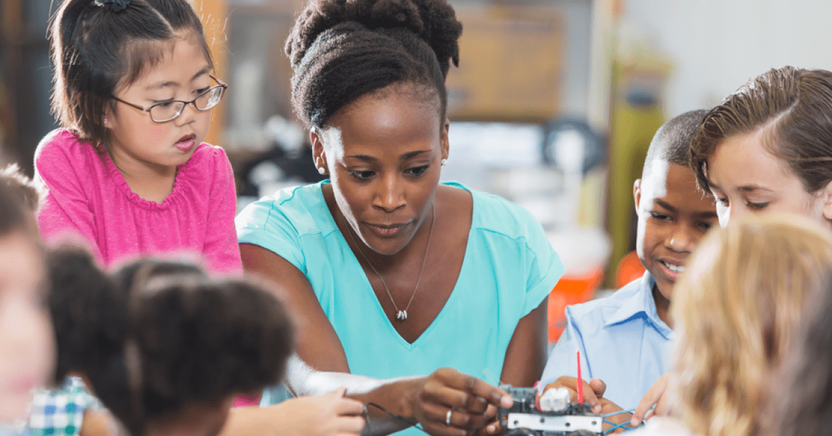 children learning with teacher