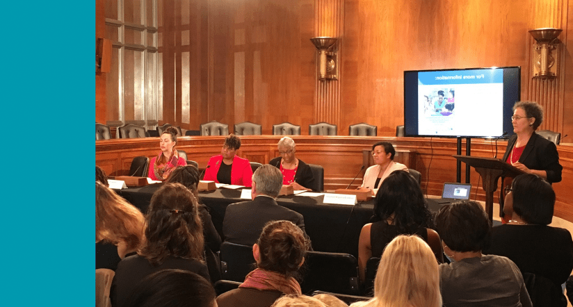 Presentation in a full room during a congressional briefing 