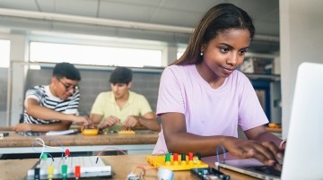 A student working on a robotics assignment.