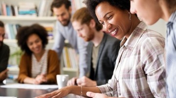 A group of people working on a project in an academic setting