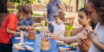 Children learning at an outdoor lesson.